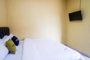 Urbanview Hotel Telu Wolu Monjali by RedDoorz