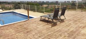 Chalet con piscina comunitaria y vistas al castillo en Peñiscola-3 terrazas-WIFI-parking