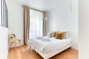 Appartements New Large Studio in the Heart of Paris 12 : photos des chambres