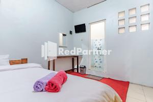 Nafisa Homestay Syariah Near Jatim Park 3 Batu Mitra RedDoorz