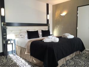 Hotels Jehan De Beauce - Les Collectionneurs : photos des chambres