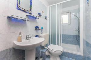 Three-Bedroom Apartment room in Apartment Goge