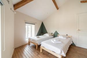 Appartements Les Nuits Lupeennes : photos des chambres