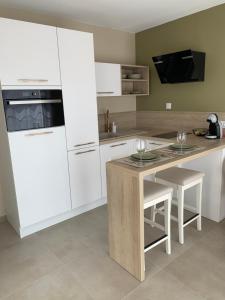 Appartements Le Studio 30 : photos des chambres