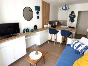 Appartements Le Palais Blanc - A 90m de la Grande Plage - Parking prive : photos des chambres