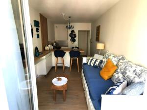 Appartements Le Palais Blanc - A 90m de la Grande Plage - Parking prive : photos des chambres