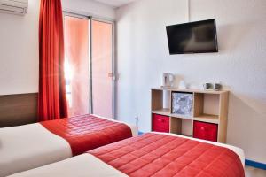 Hotels Cit'Hotel des 2 Golfs : photos des chambres