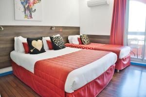 Hotels Cit'Hotel des 2 Golfs : photos des chambres
