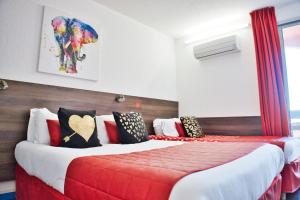 Hotels Cit'Hotel des 2 Golfs : photos des chambres