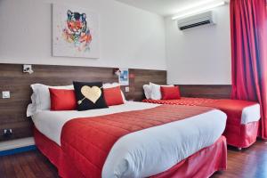 Hotels Cit'Hotel des 2 Golfs : photos des chambres