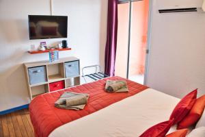 Hotels Cit'Hotel des 2 Golfs : photos des chambres