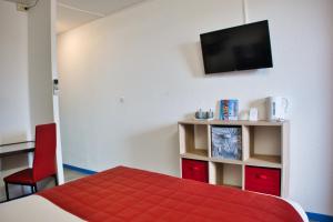Hotels Cit'Hotel des 2 Golfs : photos des chambres