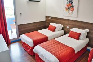 Hotels Cit'Hotel des 2 Golfs : photos des chambres