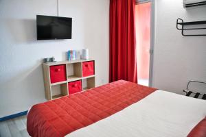 Hotels Cit'Hotel des 2 Golfs : photos des chambres