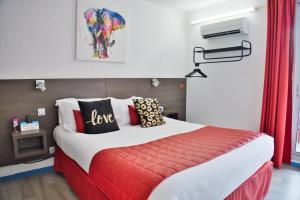 Hotels Cit'Hotel des 2 Golfs : photos des chambres