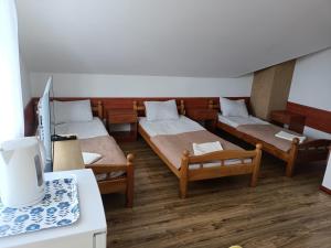 Pokoje Gościnne u MARCINA- sala zabaw, basen, melex, rowery, grill, mini dmuchaniec