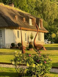 Maisons de vacances LES 2 CHAUMIERES Piscine & Spa : photos des chambres