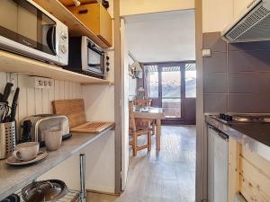 Studio moderne, ski aux pieds, balcon sud, centre Les Menuires - FR-1-344-888