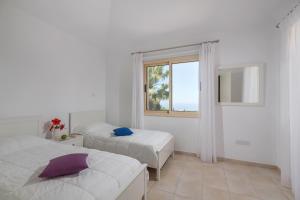 Resitour - Perneri Three Bedroom Villas