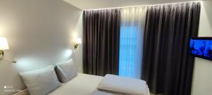 Pilkieji apartamentai, iki jūros 350m