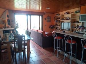 Casa con jardín en primera línea de playa