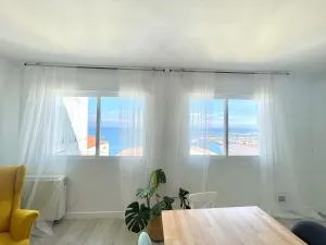 Playa y ciudad. - Artes