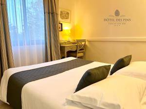 Hotels Hotel des Pins : photos des chambres
