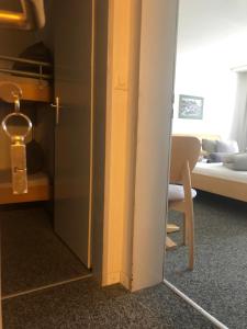 Family Room (2 Adults + 2 Children) room in Hotel Le Postillion