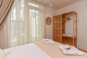 Jaukus pajūrio namelis BOHO BEACH HOUSE su baseinu