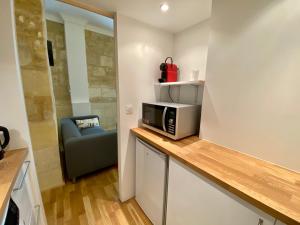 Charmant studio rénové et climatisé