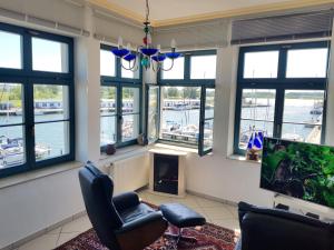 Ferienwohnung Yachthafenidyll - direkte Wasserlage am Hafen