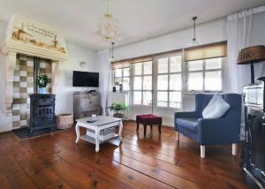 Idyllisch en knus huisje met prachtige veranda.