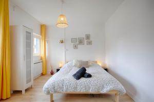 Appartements Le P'tit Parisien : photos des chambres