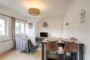 Appartements Le P'tit Parisien : photos des chambres