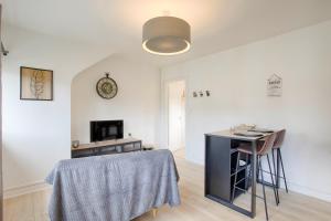 Appartements Le P'tit Parisien : photos des chambres