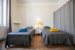 Maisons de vacances Maison en plein centre avec piscine garage et clim : photos des chambres