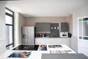 Maison en plein centre avec piscine garage et clim