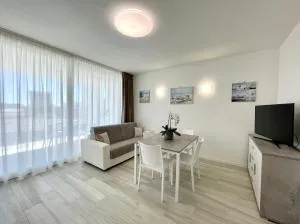C Palace - Carraro Immobiliare Jesolo - Family Apartments - Passarella