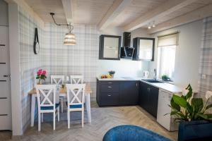 Two-Bedroom Townhouse room in AMBRE Domki letniskowe