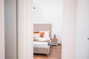 Two-Bedroom Apartment with Balcony and Sea View room in Apartments Cungu