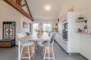 Maisons de vacances Maison moderne avec terrasse et grand jardin : photos des chambres