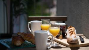 Appartements MAMA with aircon including a parking space at 300 meters : photos des chambres