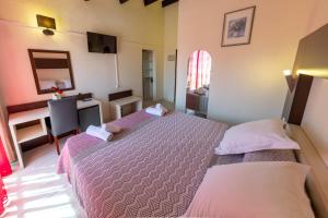 Family Room (2 Adults + 2 Children)  - heated swimming pool - free parking room in Hotel Hélios