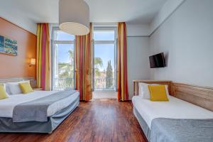 Hotels Hotel Mileade L'Orangeraie - Menton : Chambre Triple - Vue sur Jardin