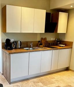 Appartements Le Donjon de Lily - Coeur de La Cite Medievale : photos des chambres