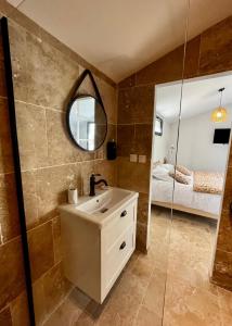 Appartements Le Donjon de Lily - Coeur de La Cite Medievale : photos des chambres