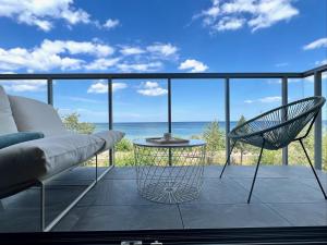 Tuż przy plaży - nowoczesny apartament z tarasem i pięknym widokiem na Bałtyk