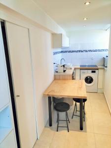 Appartements Superbe f1 en bord du lac : photos des chambres