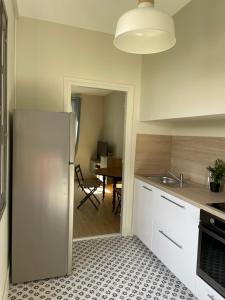 Appartements Le Marceau - Maison climatisee avec jardin : photos des chambres