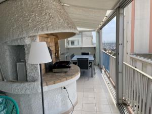 Appartements Grand T5 4 etoiles officiel Full Clim centre vue port mer 100 m plage : photos des chambres